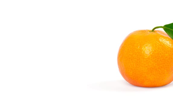 Tangerine with green leaves isolated on white