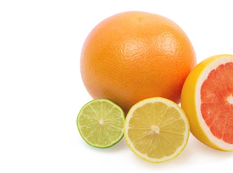 Image of a fresh whole lime, lemon and orange isolated on white