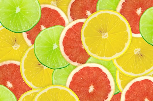 Abstract background of citrus slices. Closeup. Studio photography.