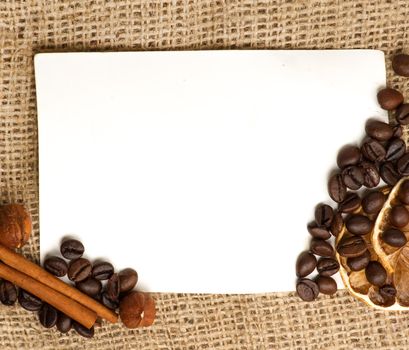 Menu Design.Old paper, coffee bean, cinnamon, lemon, burlap.