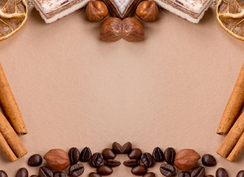 Close up of coffee, cinnamon, nuts, sweet on old paper material. Place for text.