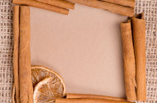 old paper for recipes and spices on burlap closeup