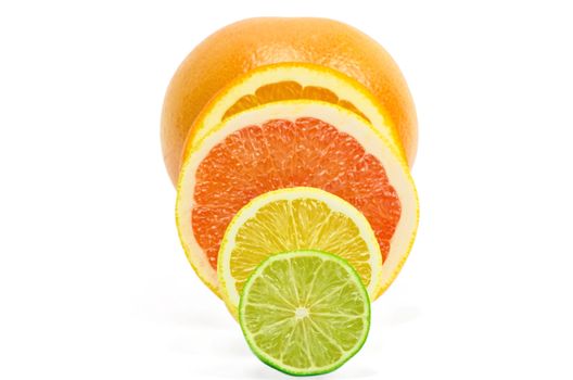 Vitamin C Overload, Stacks of sliced fruit isolated on white