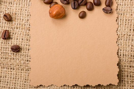 old paper for recipes and spices on burlap closeup