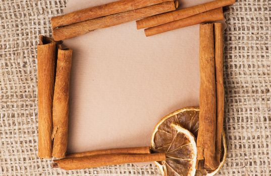 old paper for recipes and spices on burlap closeup