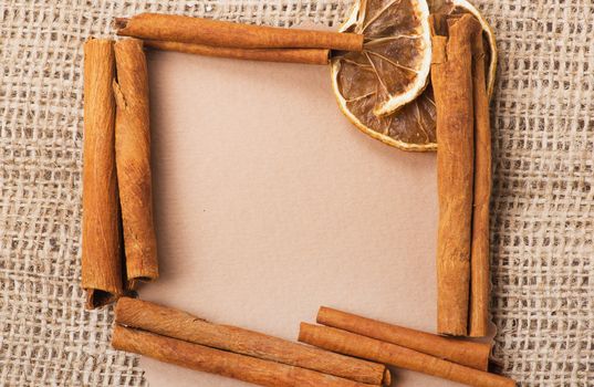 old paper for recipes and spices on burlap closeup
