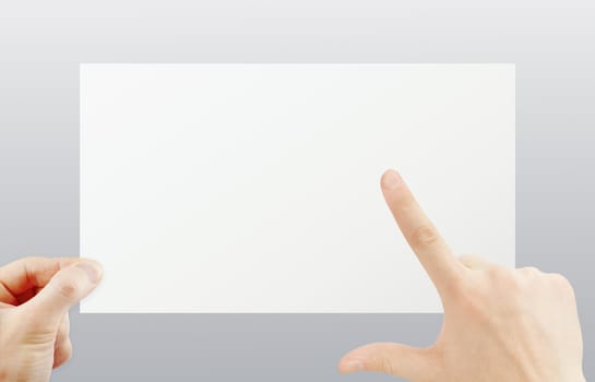 Hand holding paper