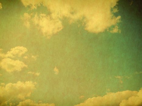 Vintage background in the blue shade with clouds