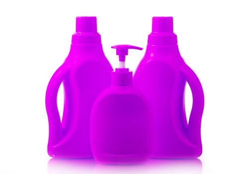 Colored plastic bottles isolated on white background