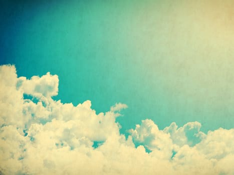 Vintage background in the blue shade with clouds
