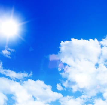 Blue sky with clouds and sun  