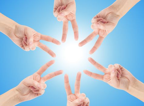 Hands of teamwork , forming the star shape
