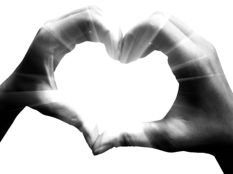 love shape hand silhouette in sky
