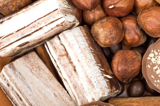 coffee beans, cinnamon and nuts background