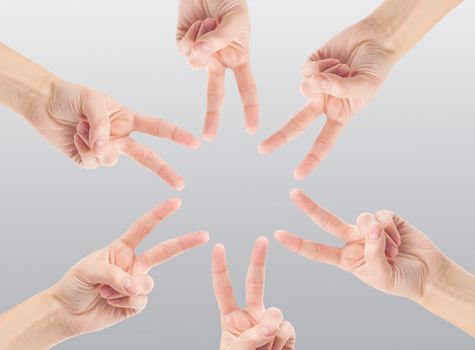 Hands of teamwork , forming the star shape