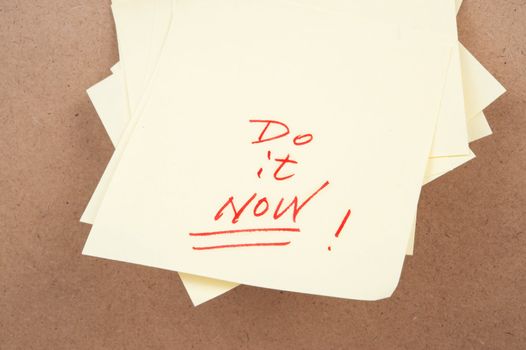 Do it now written on sticky note