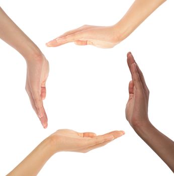 Conceptual symbol of multiracial human hands making a circle on white background with a copy space in the middle