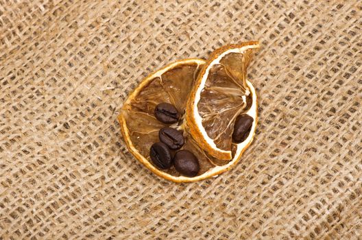 lemons and coffee beans on burlap