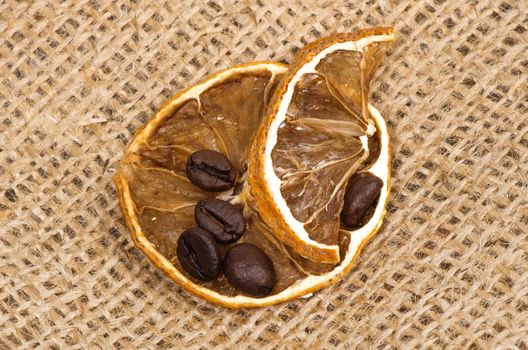 lemons and coffee beans on burlap
