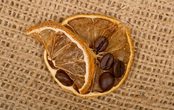 lemons and coffee beans on burlap