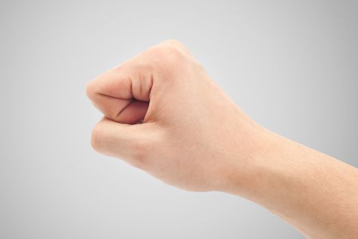 Fist. Gesture of the hand on white background