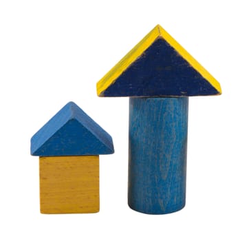 composition of yellow blue wooden retro log toy brick constructions isolated on white background.
