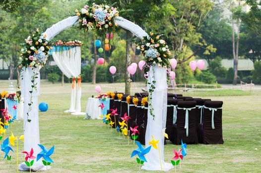 Flower arch for wedding on the lawn