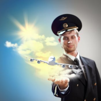 Image of pilot with airplane taking off from his hand