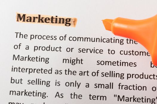 Marketing item on paper with a highlighter