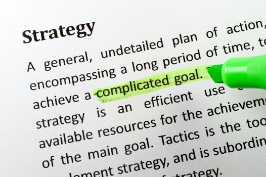 Strategy item on paper with a highlighter