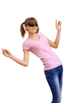 Happy smiling girl dancing and listening to music