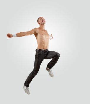 Modern style male dancer jumping and posing. Illustration