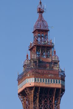 Top of the historic victorian Blackpool Tower which is a popular tourist attraction and member of the World Federation of Great Towers