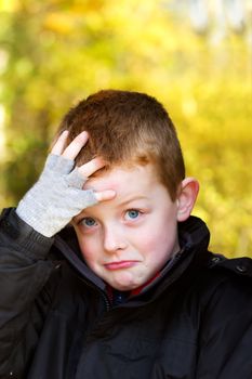 little boy realising he has made a mistake