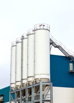 concrete mixing factory on a grey cloudy day