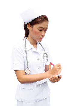 Asian female nurse writing medical report on white background