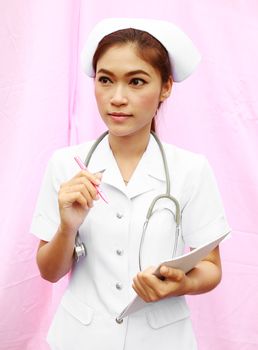 Asian female nurse with medical report