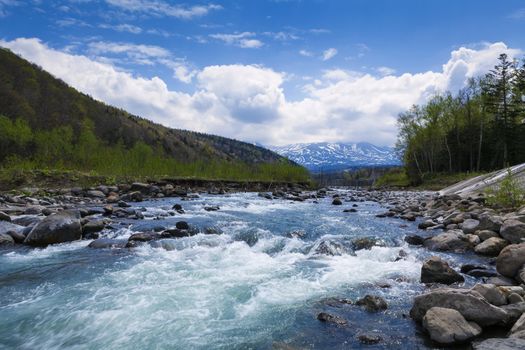 Streaming river from mountains  in Hokkaido, Japan