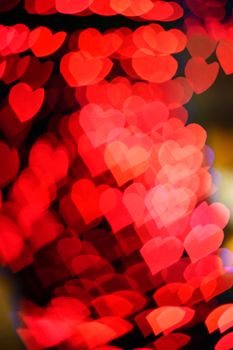 red  hearts bokeh as background