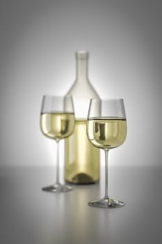 An image of a white wine bottle and two glasses