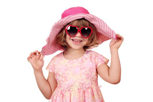 happy little girl with big hat and sunglasses on white