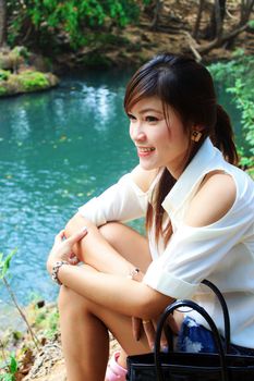 beautiful woman near the river