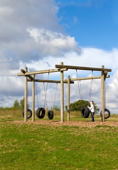 little boy playing at the park