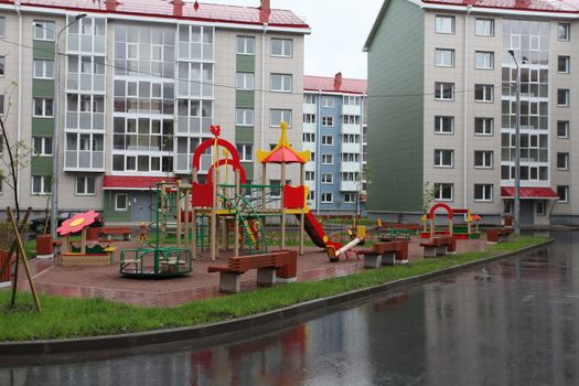 view of modern house with a available playground