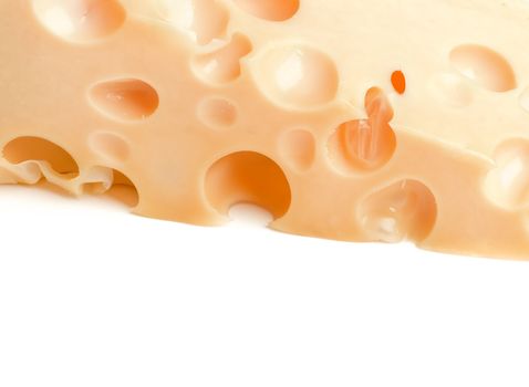 Frame of Perfect Emmental Cheese closeup isolated on white background