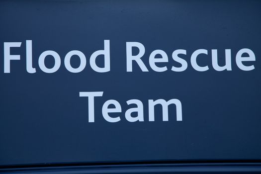 The words 'Flood Rescue Team' written in white on a dark blue background.