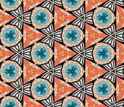Seamless tiled mosaic pattern of kaleidoscopic altered hexagonal real ceramic tiles arranged to form colorful triangle shapes for a repeated textured background effect.