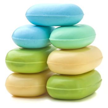 Stack of new colorful Soap Bars on white background.