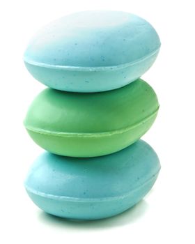 Stack of new colorful Soap Bars on white background.