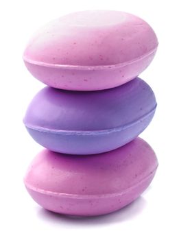 Stack of new colorful Soap Bars on white background.